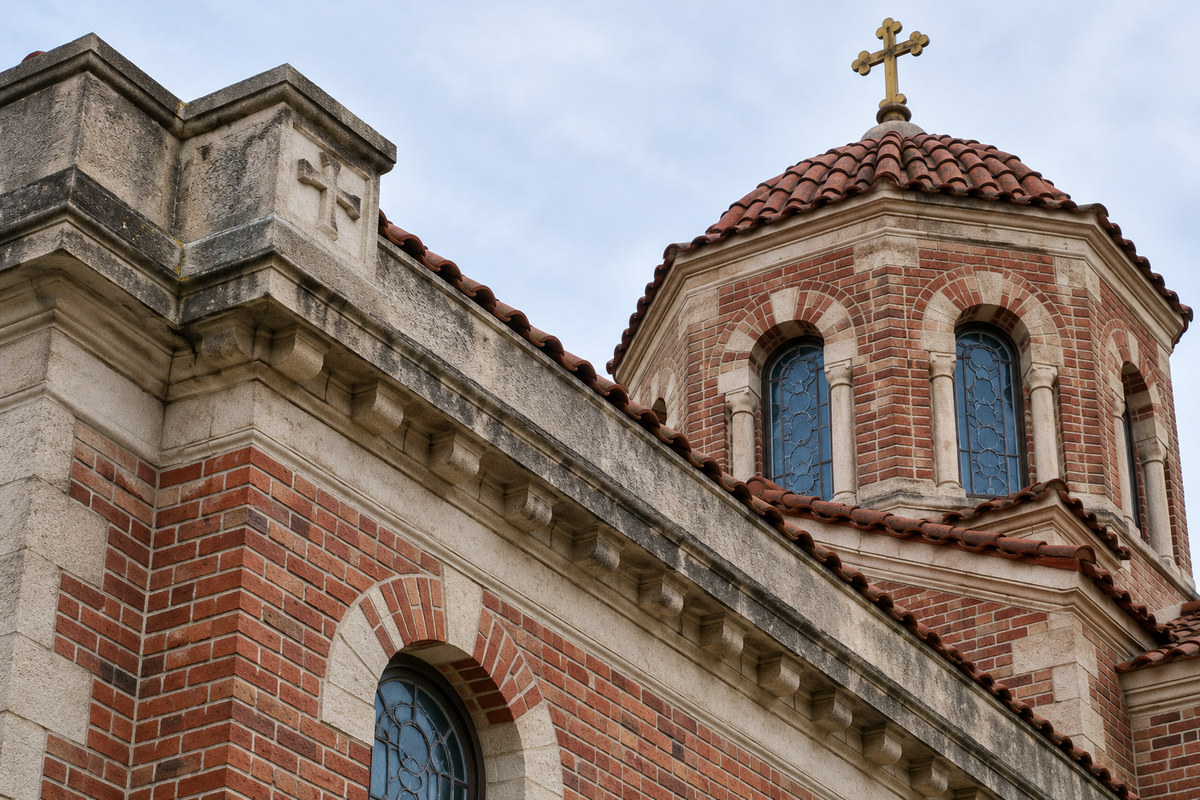Illustrative close view of brick masonry and stonework on a historic Greek Orthodox church.